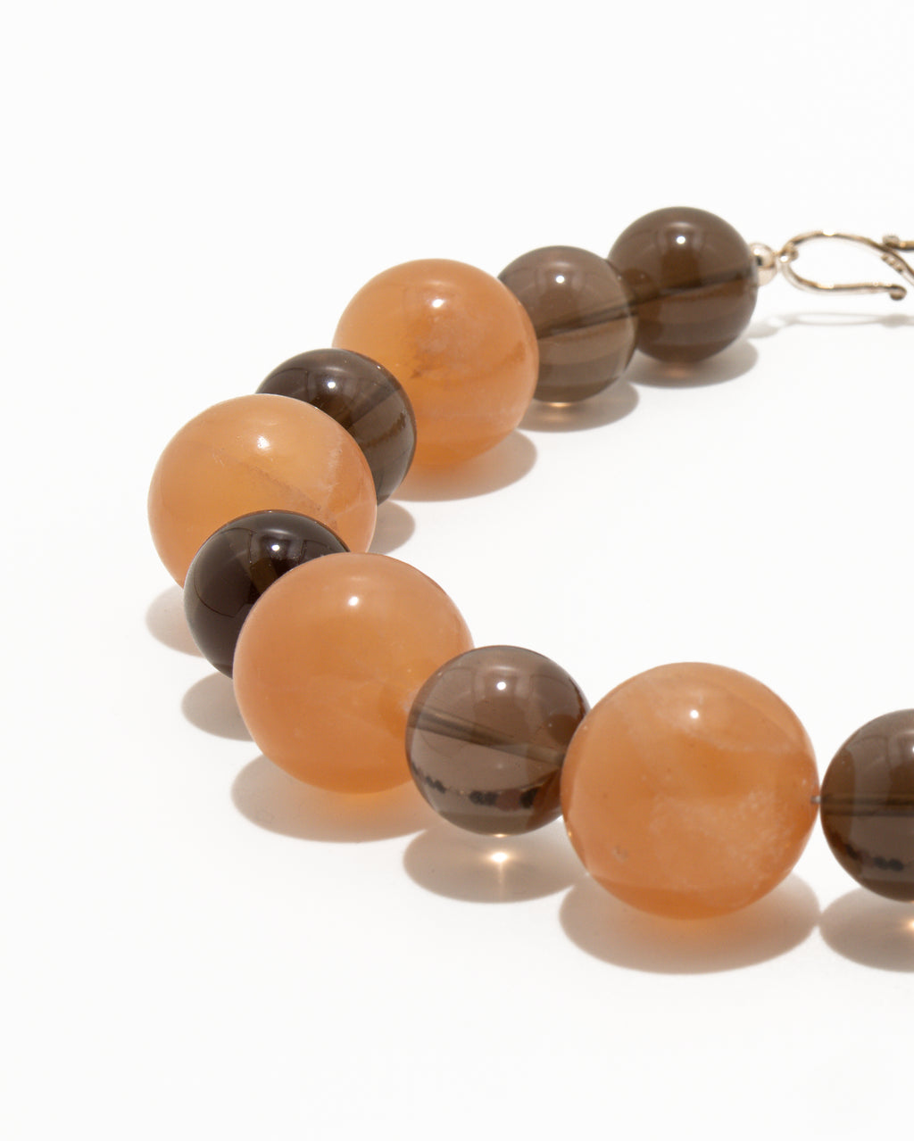 Raha Necklace: Orange Calcite, Smoky Quartz