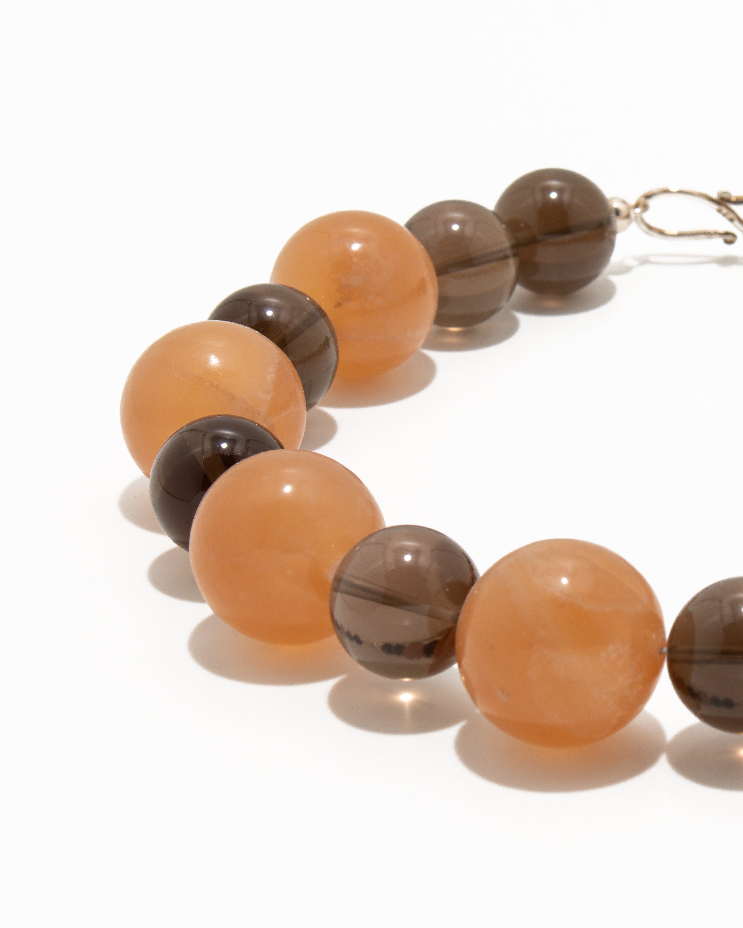 Raha Necklace: Orange Calcite, Smoky Quartz