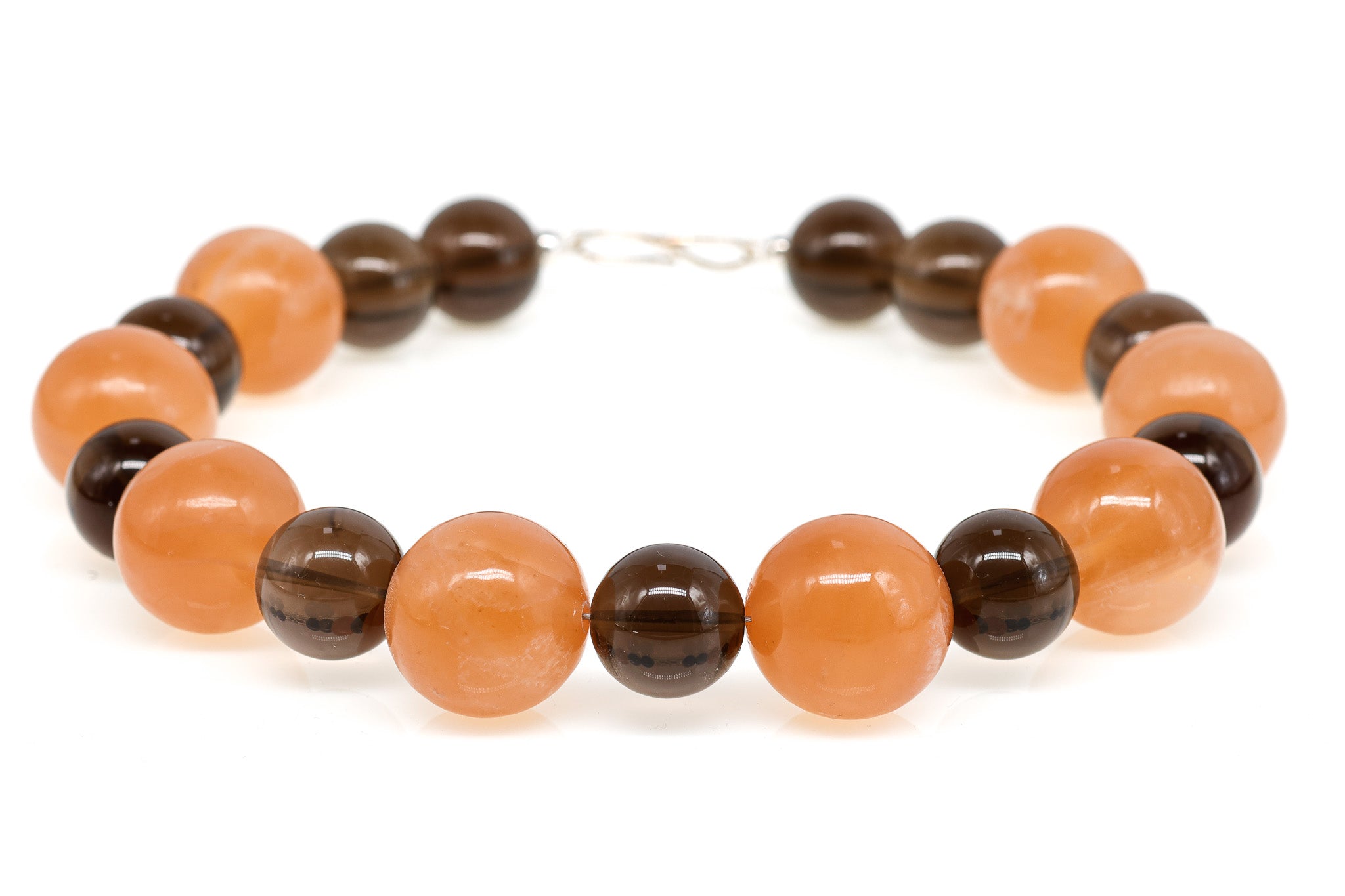 Raha: Orange Calcite, Smoky Quartz
