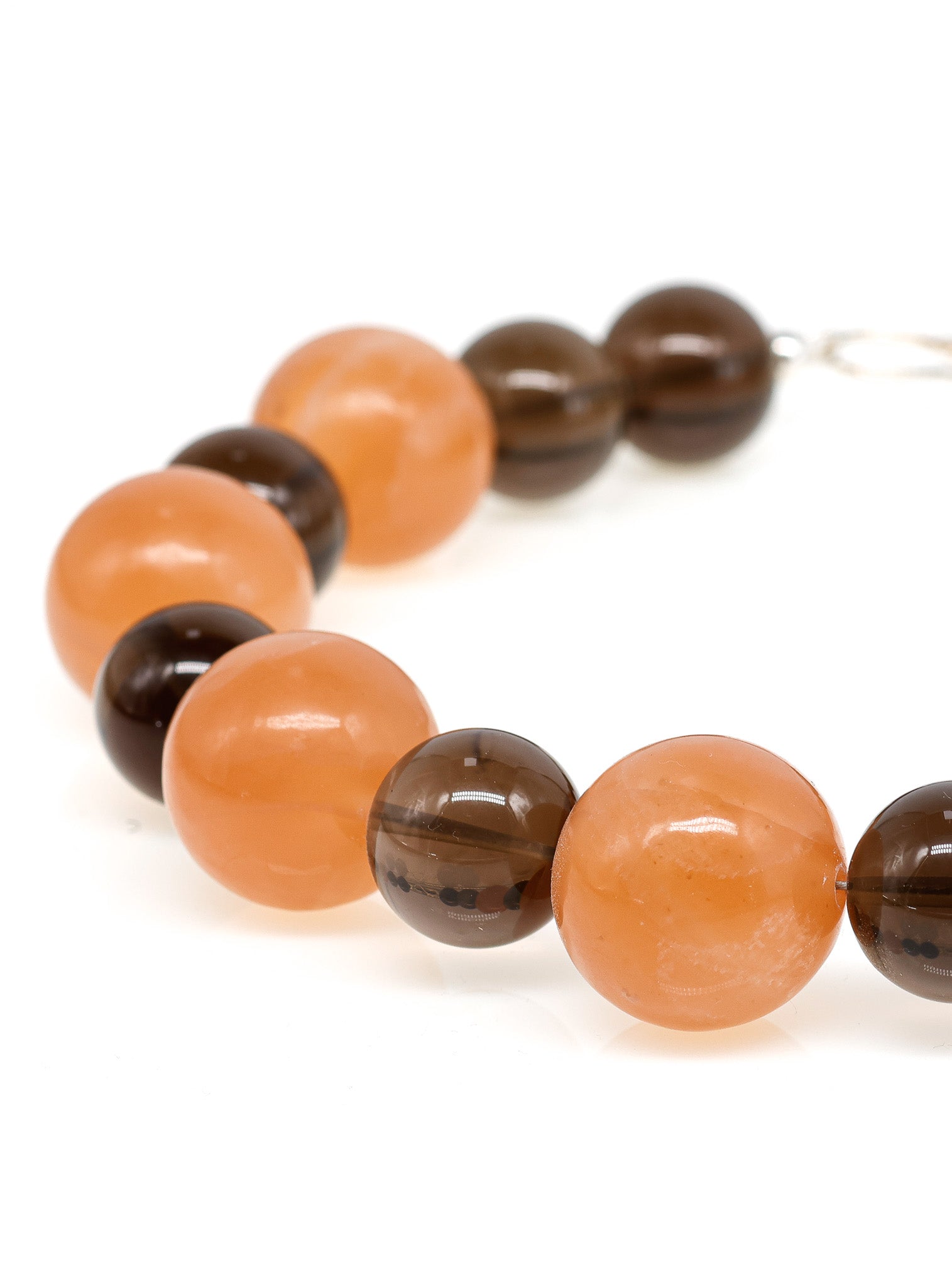 Raha: Orange Calcite, Smoky Quartz