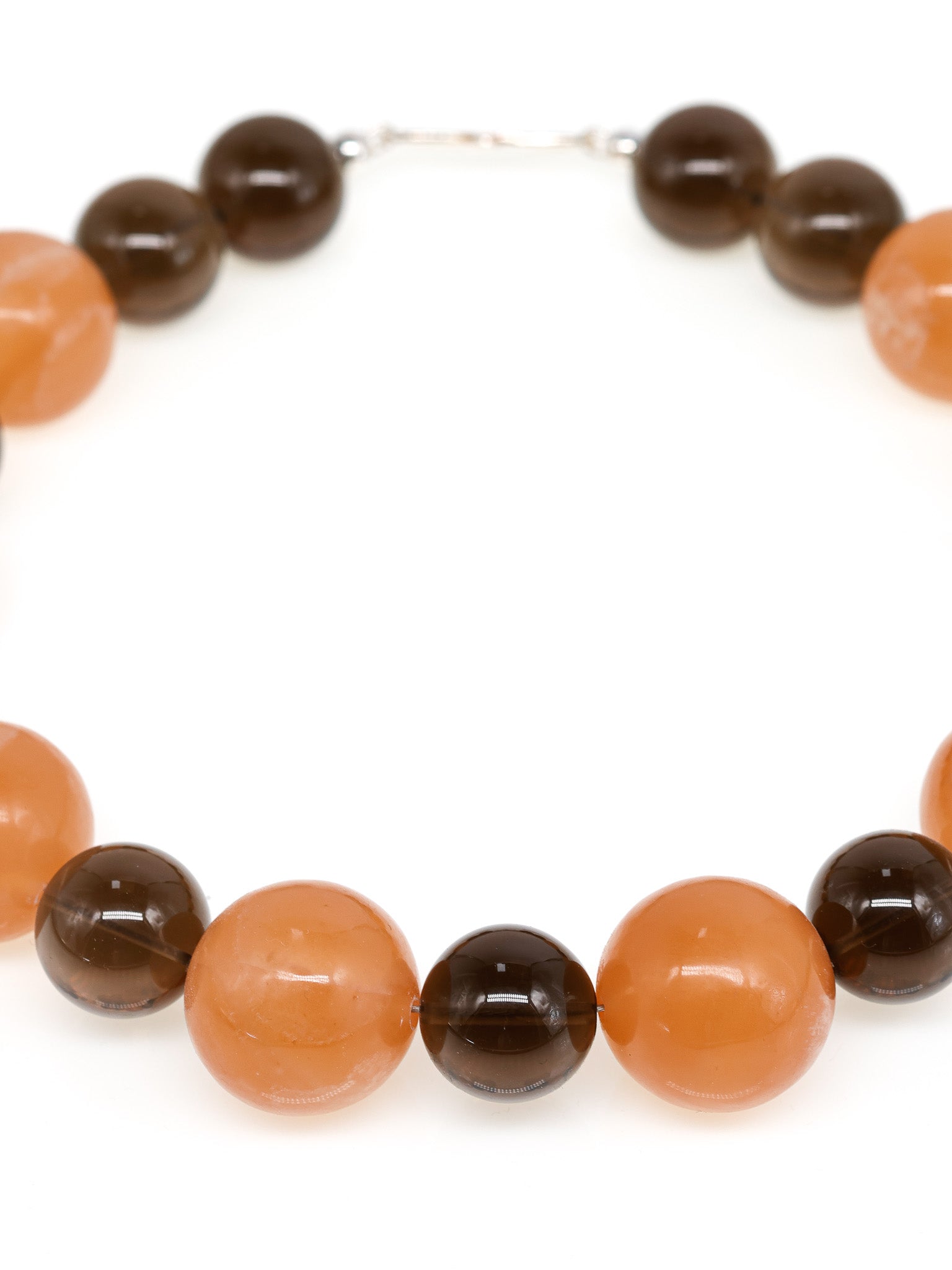 Raha: Orange Calcite, Smoky Quartz