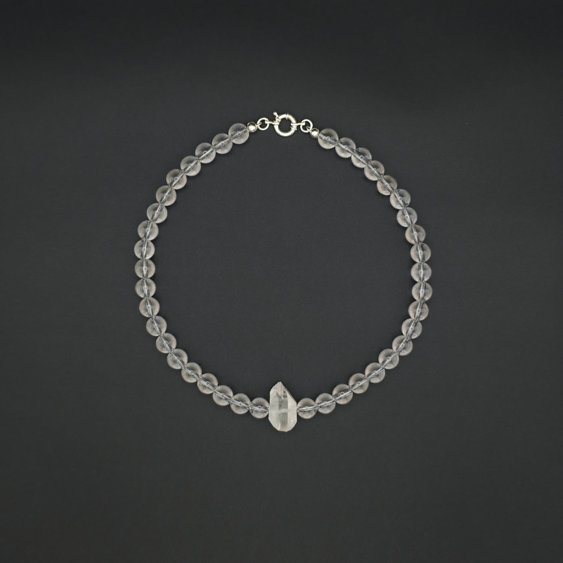 Uwazi: Crystal Quartz 10mm above