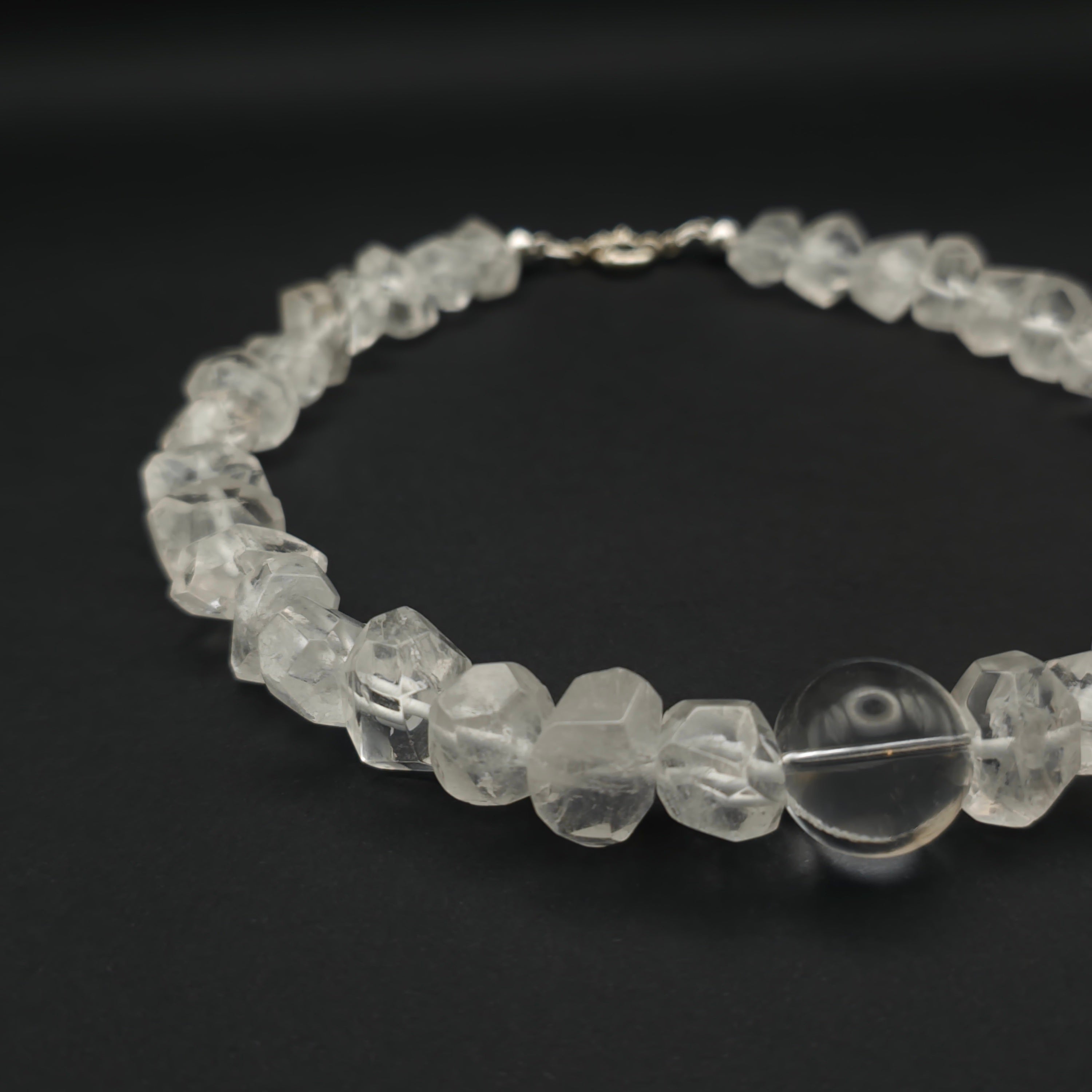 Uwazi: Tumbled-crystal quartz left view